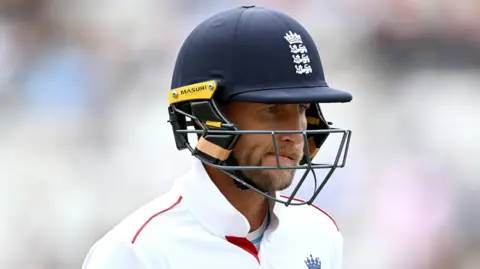 England batter Joe Root walks off after being dismissed