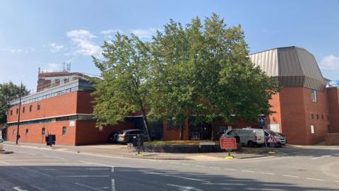 The exterior of Swindon Crown Court on a sunny day