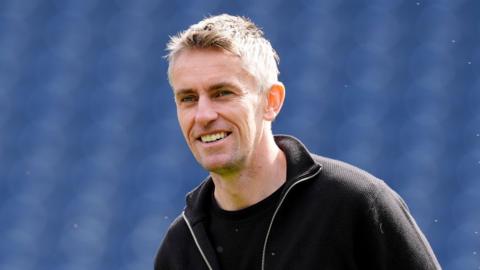 Ipswich Town boss Kieran McKenna smiling before his side's match at West Bromwich Albion