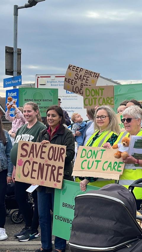 Protesters with placards