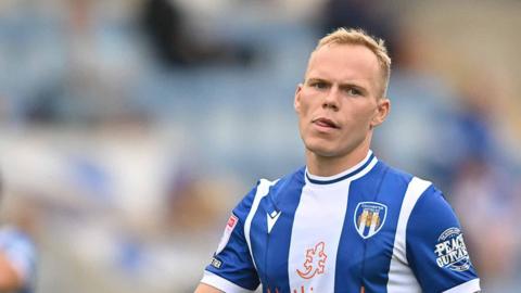 Anthony Scully in action for Colchester