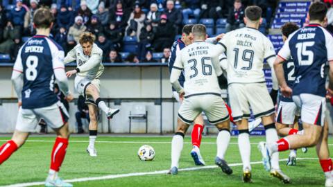 Dundee United's Julius Eskesen scores against Falkirk.