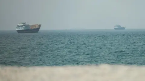 Vessels at the Strait of Hormuz, as seen from Musandam,Oman, July 13, 2026.