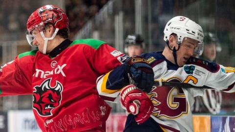 Players clsh during Cardiff Devils v Guildford Flames