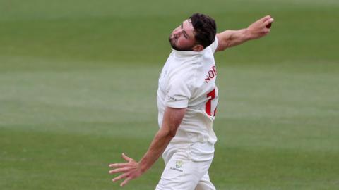 Tom Norton bowling