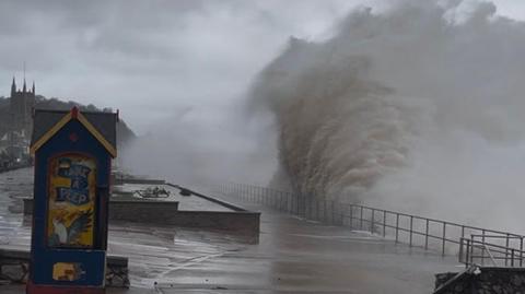 Teignmouth seafront showing large waves battering the seafront
