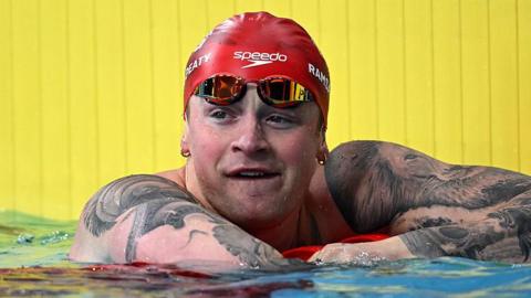Adam Ramsay-Peaty in the pool at the end of a race