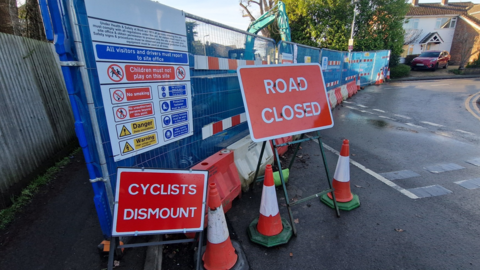 A general view picture of signs blocking people's access in Evendons Lane in Wokingham.