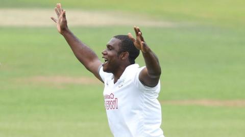 Keith Barker celebrates after taking a wicket for Hampshire