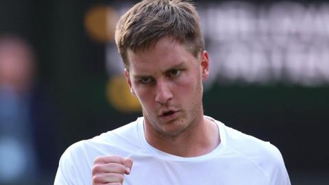 Britain's Henry Patten celebrates winning a point