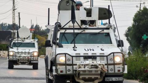 Vehicles of the United Nations Interim Force in Lebanon (Uniful) patrol in Marjeyoun in southern Lebanon on 11 October 2024 