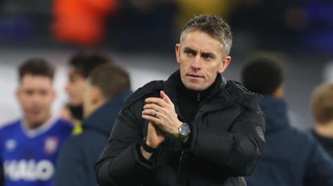 Ipswich Town boss Kieran McKenna applauds the fans
