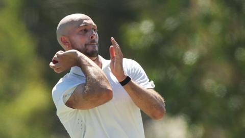 Gabe Bell bowling for Tasmania