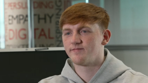 Angry Ginge. Young man with ginger hair wears a grey hoodie and looks slightly away from the camera. The picture is a still shot taken from his conversation on North West Tonight.