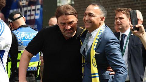 Daniel Farke and Paraag Marathe embrace after Leeds were promoted to the Premier League
