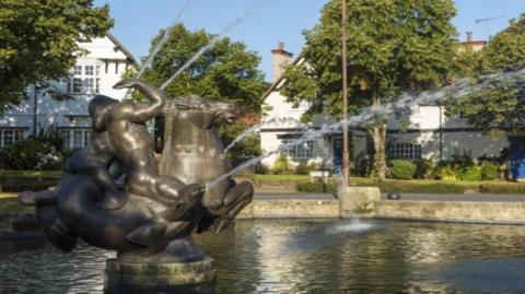 The fountain and pond before they dried up