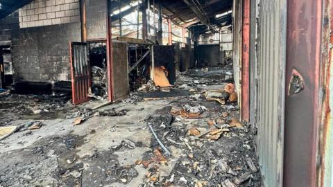 An industrial estate which has been completely gutted by a fire.