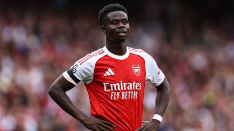 Arsenal's Bukayo Saka with his hands on his hips