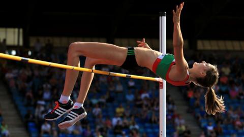 Isobel Pooley jumping over the high jump bar