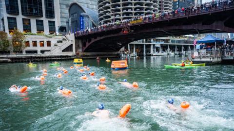 Swimmers during Chicago river swim