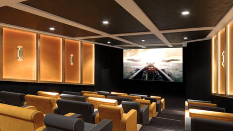 The cinema has yellow and black seating and decoration with large seats and low lighting.