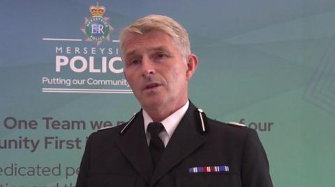 Merseyside Police deputy chief constable Chris Green in his dress uniform, with medals on his chest and epaulettes on his shoulders