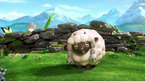 A sheeplike pokemon, Wooloo, grazing on some grass in a field. There's a stone wall behind it. You can see yellow ears and white hair popping up behind it