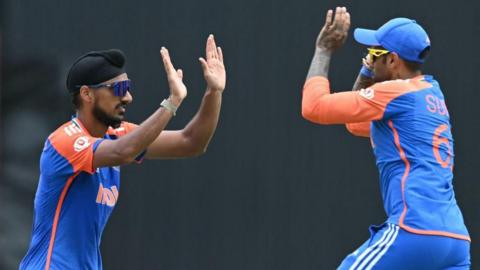 India bowler Arshdeep Singh celebrates a wicket with Suryakumar Yadav