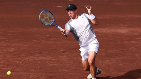Mackenzie McDonald hits a forehand shot