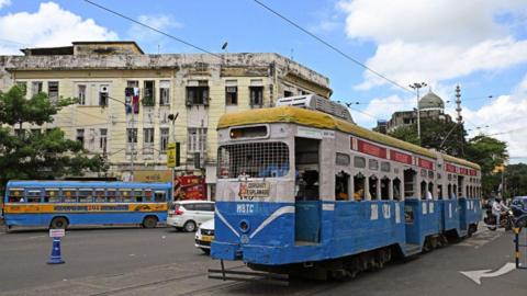  In this photo taken on September 8, 2024, passengers commute in a tram along a street in Kolkata. Introduced in the sprawling eastern city in 1873 during the early days of the imperial British Raj, trams in Kolkata were initially horse-drawn, then steam-driven. Electric-powered trams took to the streets in 1900. 