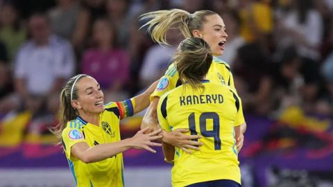 Sweden's Fridolina Rolfo celebrates scoring their third goal with Johanna Rytting Kaneryd and Kosovare Asllani