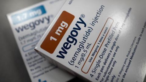 A close up of the packaging for Wegovy, a weight loss injection. It's a white box with the medication name and dosage written on it.