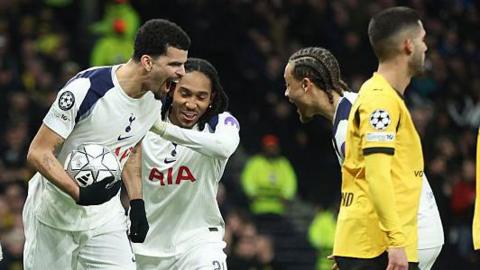 Tottenham players celebrate their second goal against Borussia Dortmund