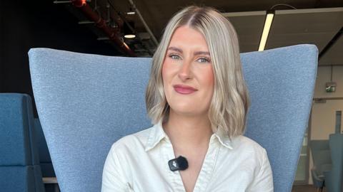 Presenter looking at camera