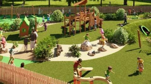 An artist's impression of children playing on a variety of play equipment, including balancing on boulders and exploring a tunnel.