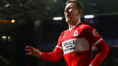 Matt Targett celebrates scoring