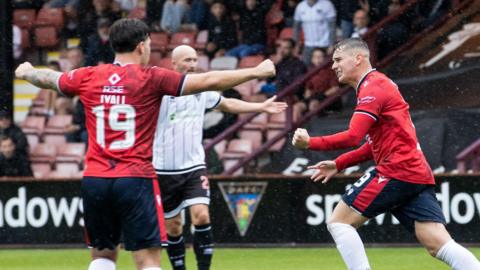 Ronan Hale celebrates