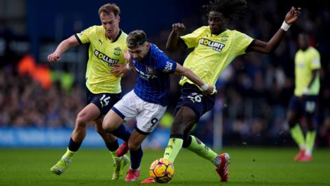 Lesley Ugochukwu tries to tackle an Ipswich player