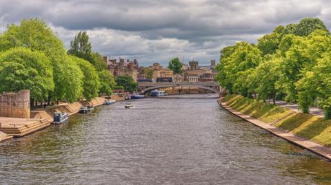 The River Ouse in full flow through the centre of York