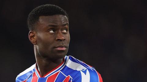 Crystal Palace defender Marc Guehi looking over his shoulder