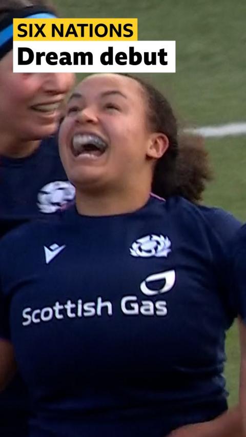 Scotland's Aicha Sutcliffe celebrates with a big smile 