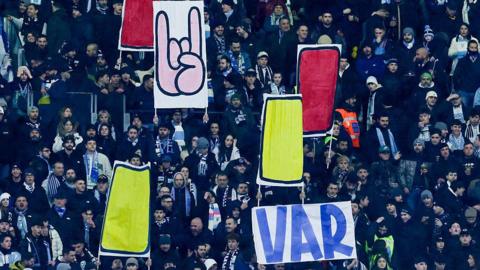 Lazio fans protest against the use of VAR during the match against Como