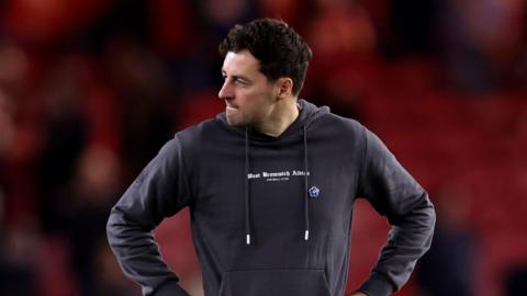 West Bromwich Albion boss Ryan Mason watches his team with his hands on his hips