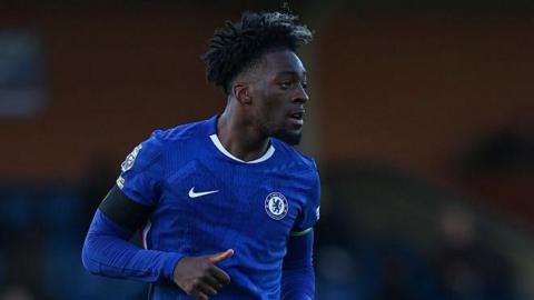 Axel Disasi looking across the pitch while playing for Chelsea's Under-21s