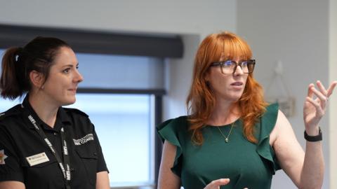 Housing Secretary Angela Rayner (right) speaking to emergency responders who fought the home-destroying Stourbridge fires
