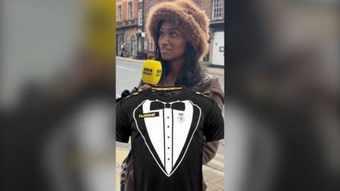 A woman holds a BBC Sport microphone; superimposed is an image of a football shirt with a dinner jacket and bow tie design