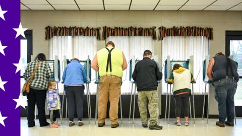 People vote at a polling station at Addison Town Hall in Allenton, Wisconsin