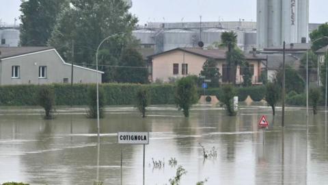 picture shows flooded roads in the town of Cotignola, Italy