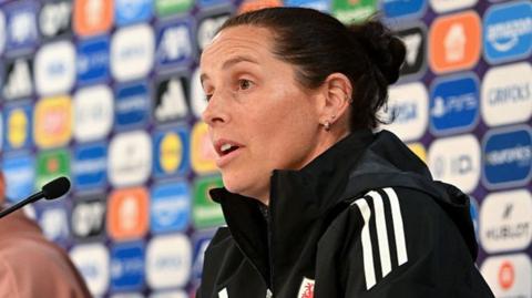Wales boss Rhian Wilkinson speaks at a press conference
