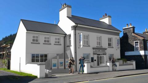 An illustration of the redeveloped Fairfield House, which is white and has Culture Vannin written above the door. 